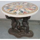 A good Regency style circular specimen marble table on a figural bronze base in the form of winged