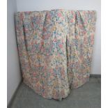 A pair of good quality lined curtains in a William Morris patterned material. Each measures H183cm