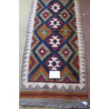 A Maimana Kilim runner, good strong colours and condition good. 196cm x 65cm.