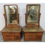 A pair of early 20th century Japanese elm Kyodai mirror cabinets, the swing bevelled mirrors on