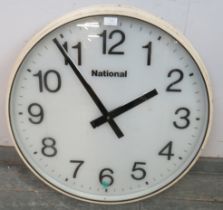 A large vintage Japanese National Railways wall clock, within a metal casing. Diameter 62cm D18cm (