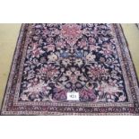 A North West Persian Heriz carpet, muted floral design. 190cm x 125cm. Condition report: Good