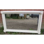 A 19th century rectangular overmantle mirror within a carved rope-twist surround with applied