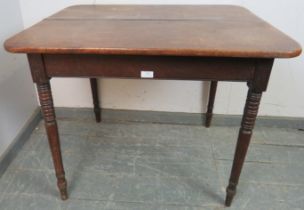 A Georgian mahogany tea table with rounded corners, on tapering turned supports. H71cm W90cm