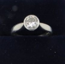 A platinum diamond solitaire ring, size I, diamond approx 0.75cts, boxed. Condition report: Some