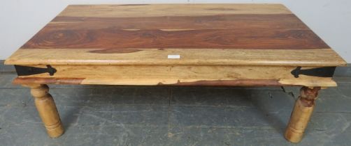 An Eastern Jali wood rectangular coffee table, with metal bound corners, on turned supports. H40