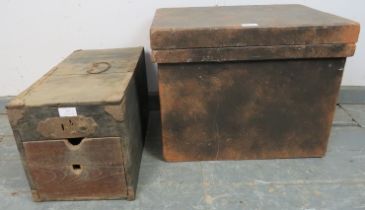 A 19th century Japanese elm cash box, the top with wrought iron carry handle and lifting lid, the