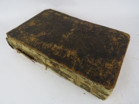 The Book of Martyrs by the Reverend John Fox, dated 1811. Leather bound and printed by Thomas Kelly,
