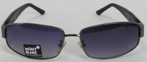 A pair of Mont Blanc sunglasses. Code MB 83S COL 03 64/16 - 135 - MONTB LA.NC Made in Italy.