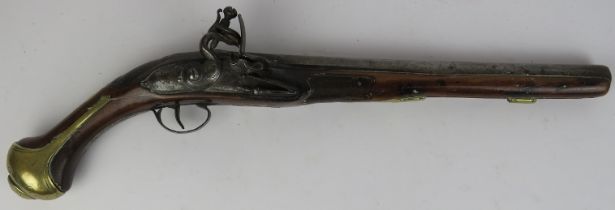 A flintlock brass mounted wood and iron holster pistol, late 17th/early 18th century. 49.5 cm