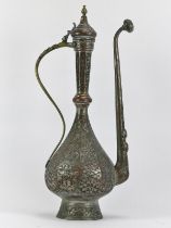 A large Indo-Persian tinned copper lidded ewer with chased decoration, 19th/early 20th century. 57