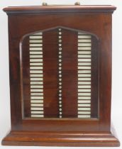 A mahogany coin collection display cabinet, late 19th/early 20th century. With twenty eight trays