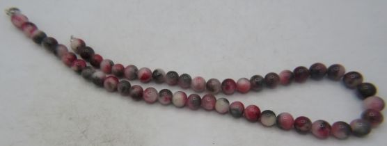 A watermelon jade necklace with 925 stamped lobster clasp. Approx 20"/51cm long. Condition report: