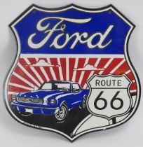 A vintage Ford Motors service station Route 66 enamelled metal sign. Of shield form depicting a Ford