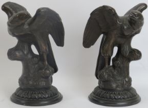 A pair of mid Victorian bronze models of eagles, circa 1865. Both bearing Victorian registered