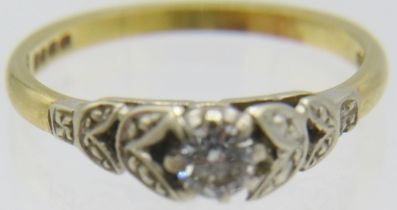 An 18ct yellow gold solitaire diamond ring, diamond approx 0.10cts, with leaf decoration, size N.
