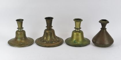 Four North Indian brass huqqa bases, 19th century. Three of bell shaped form and the other of