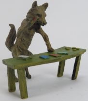 After Franz Bergman - An Austrian cold painted bronze model of wolf dealing playing cards at a