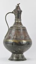 A large Middle Eastern metalwork lidded decanter jug, 19th century or earlier. Possibly 17th