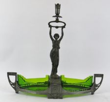 A WMF pewter centrepiece, circa 1920. The base with fan moulded triangular boat shaped green glass