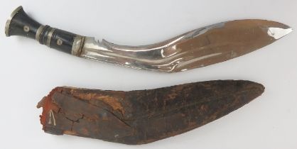 A kukri knife, late 19th/early 20th century. With a horn handle and leather scabbard. Probably