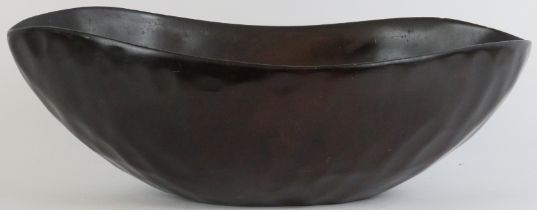 A Caribbean Haitian carved wood bowl crafted to simulate bronze, Haiti, 20th century. Signed