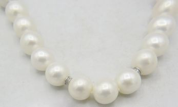 An exceptionally rare strand of soft white Australian Southsea pearls with rose undertones and 8