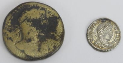 Two Roman silver and brass coins. The silver siliquae coin inscribed ‘VOT MVLT’, Valens, circa 367-