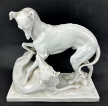 A Meissen white porcelain model of two playful greyhounds by Otto Pilz (1876-1934), 20th century. ‘