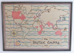 A needlework tapestry of The British Empire, dated 1932. Framed and glazed. 36 cm x 51.5 cm.