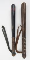 A turned wood Police truncheon and another truncheon, early 20th century. The Police truncheon