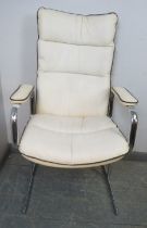 A vintage mid-century desk chair in the manner of Pieff, upholstered in white leather with black