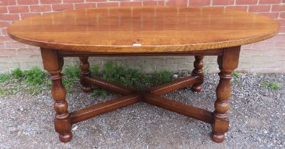 A good quality period style medium oak oval dining table by Titchmarsh & Goodwin, on baluster turned