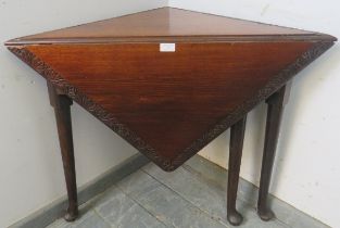A rare Georgian handkerchief tea table, the relief carved border with acanthus leaf decoration, on