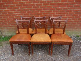 A set of six 18th century fruitwood Dutch dining chairs, having profuse marquetry inlay, the