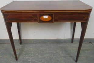 A good George III mahogany turnover tea table, satinwood strung and with parquetry inlay, on