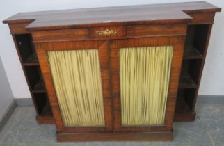 A Regency Period rosewood low breakfront bookcase, with applied gilt metal decoration, having double