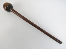 Tribal Art: A South African carved wood knobkerrie. Globular shaped club head mounted on a tapered