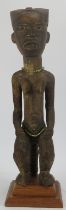 Tribal Art: A large African carved wood standing Byeri female figural statue, Fang people, Gabon.