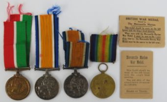 Militaria: Two groups of two World War I British military medals. Comprising a British War Medal and