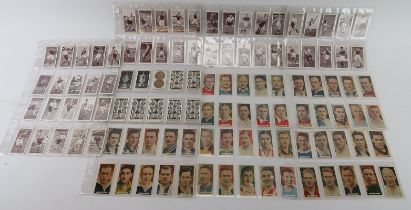 A collection of vintage British famous footballers cigarette cards, circa 1930s. Cards issued by