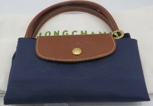 A navy Longchamp Grab Le Pliage bag. Condition report: Good condition.