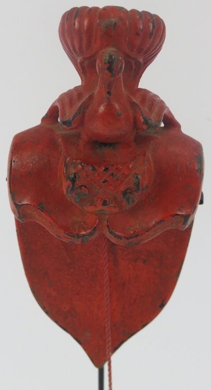 A Southeast Asian red lacquered carved wood object. Modelled with surmounted bird and cord suspended - Image 2 of 4
