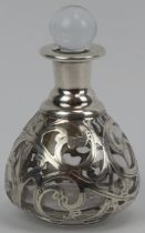 An American Art Nouveau silver overlay glass perfume bottle with stopper, circa 1900. Mark of