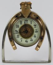 A novelty equestrian parcel gilt brass and white metal horseshoe clock, late 19th/early 20th