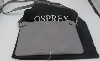 A grey Osprey crossbody bag with extra hand strap. Condition report: Good condition.