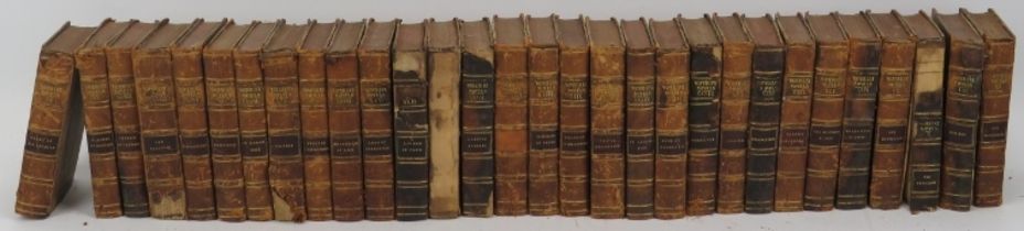 Books: A part set of Waverley novels by Guy Mannering, 30 volumes, dated 1829. Leather bound with