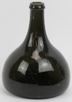 A Georgian dark green glass wine bottle, 18th/19th century. Of onion mallet form with a moulded J&