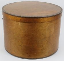 A large Venesta plywood cylindrical hat box manufactured in Estonia, dated 1896. Modelled with