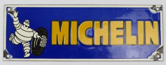 Car Memorabilia: A vintage Michelin enamelled metal advertising sign. 10.8 cm x 30.5 cm. Condition